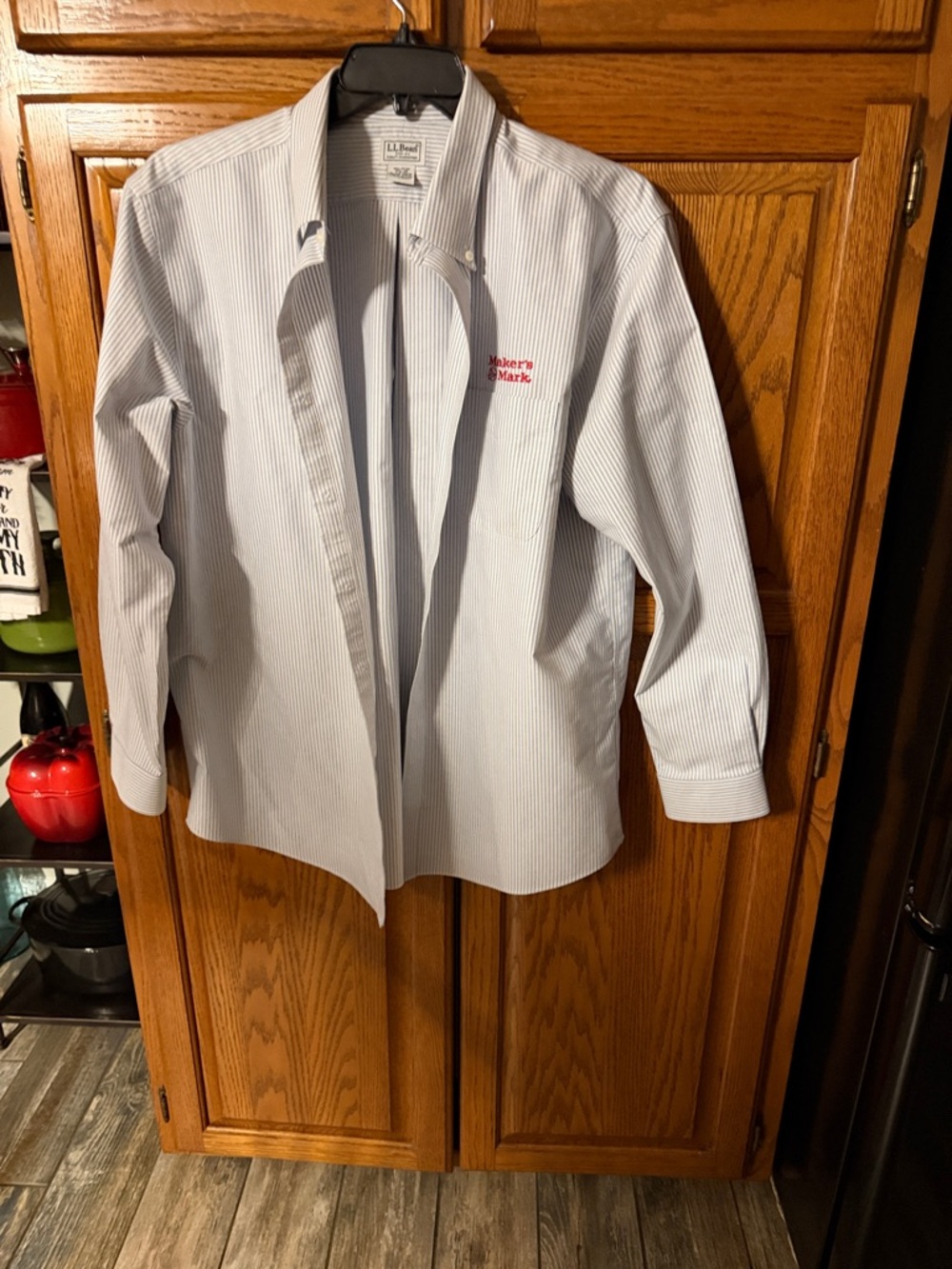 L.L. Bean Light Blue and White Striped Button-Down Shirt with Red Embroidery.